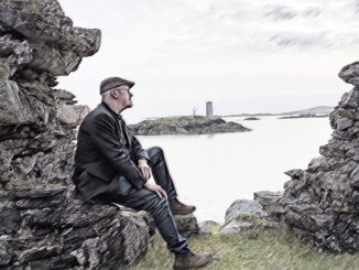 Sketch of David Mackin looking thoughtful at Cromwell's Barracks on Inishbofin