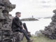 Sketch of David Mackin looking thoughtful at Cromwell's Barracks on Inishbofin