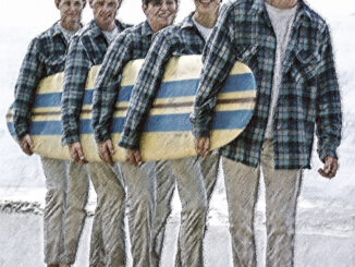 Picture of Beach Boys carrying a surf board